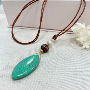 Turquoise in Leather Cord Necklace