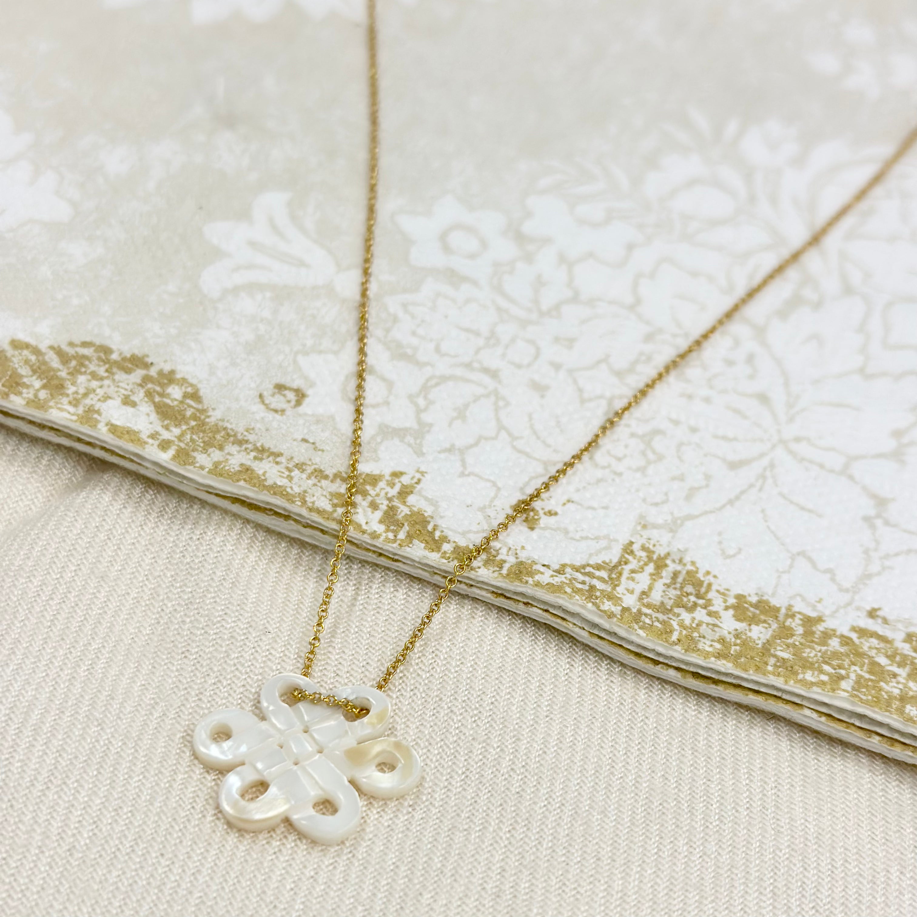 Mother of Pearl Carved Knot Pendant